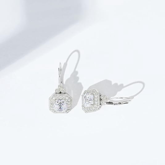 Women's silver zinc oxide on t-cut antique hanging earrings